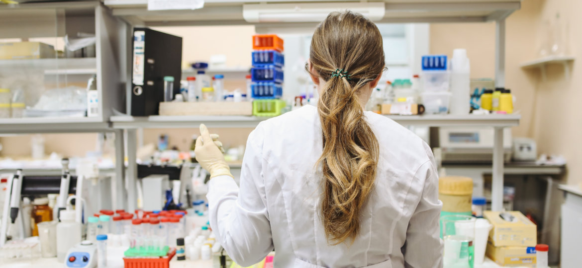 Canva - Woman In White Long Sleeved Laboratory Gown Standing